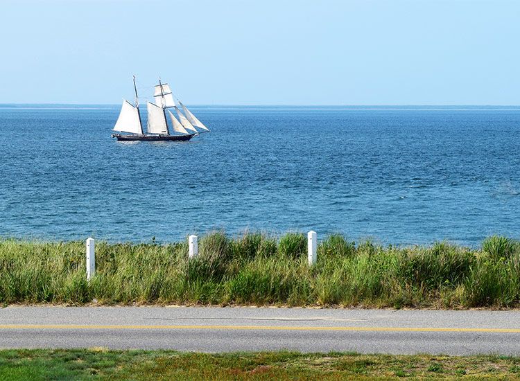 Cape Cod MA with Historic Sailboat On the Water