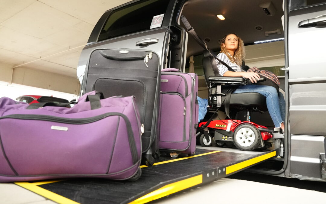 Woman Sitting in a Wheelchair Accessible Van With a Ramp