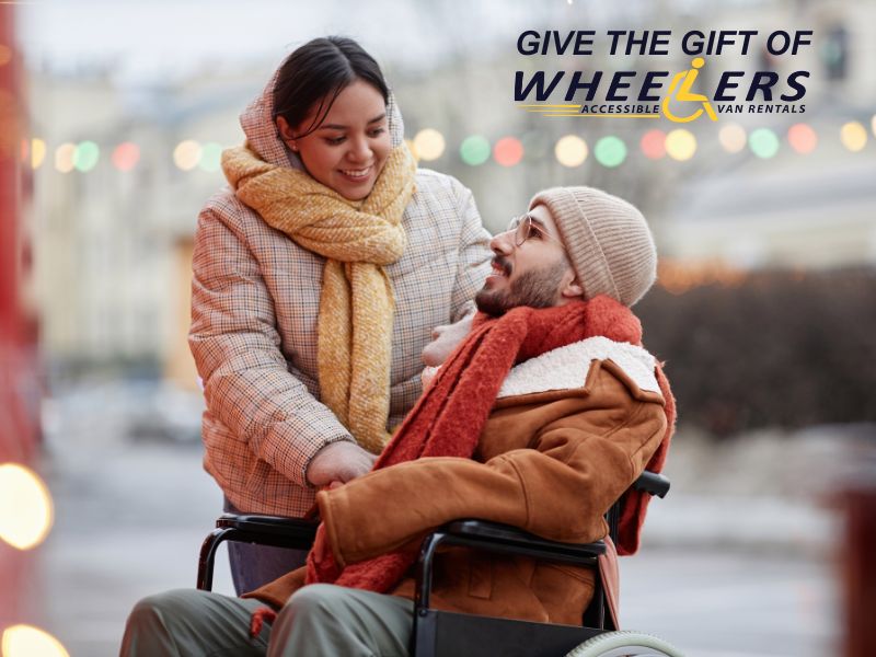 Woman speaking to partner in wheelchair during winter