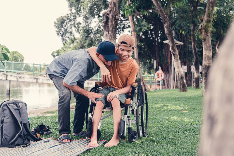 Parent and child with wheelchair